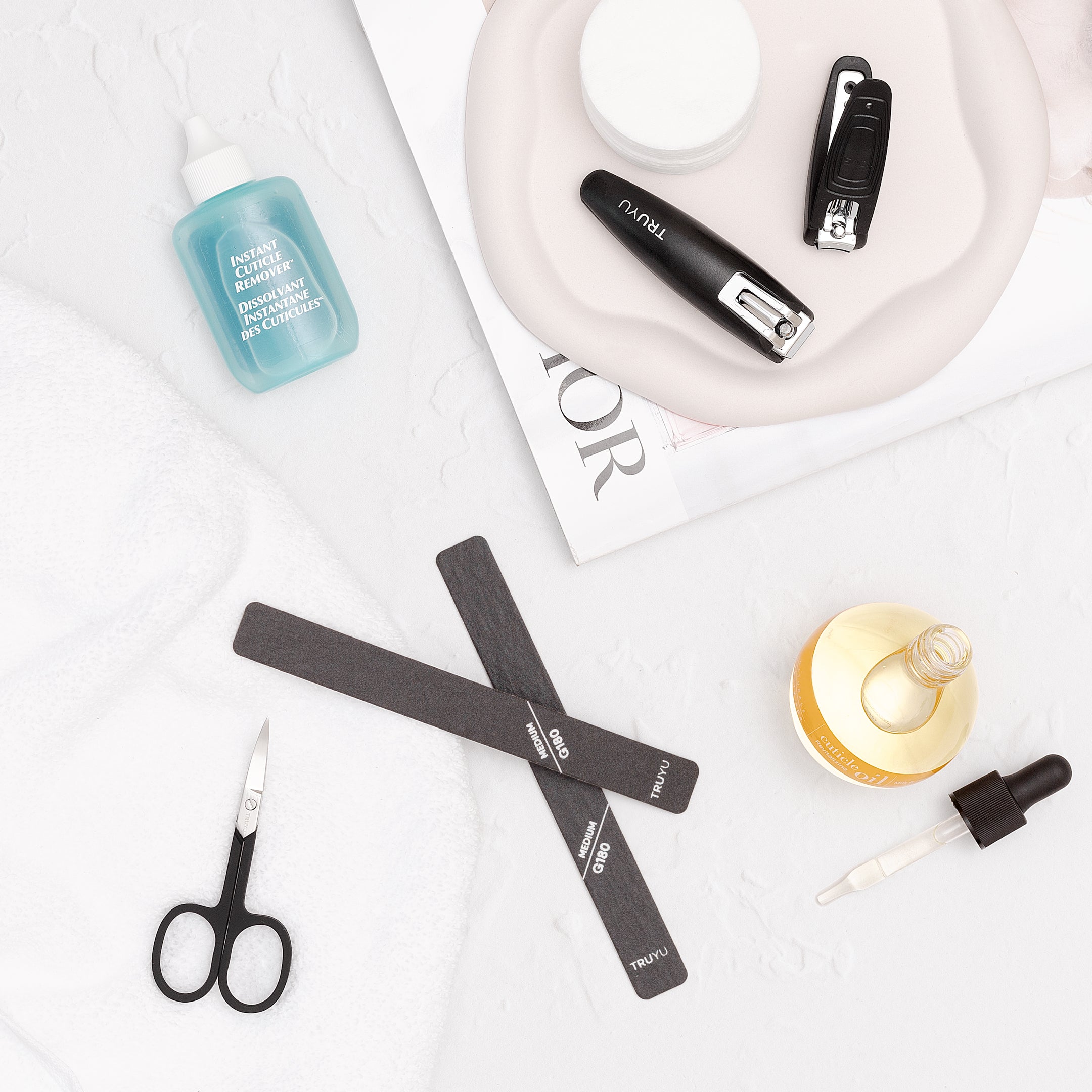 TRUYU Pro Nail Files (Fine Grit) 2 pack. with TRUYU Nail Set and black nail scissor on a stylised background.