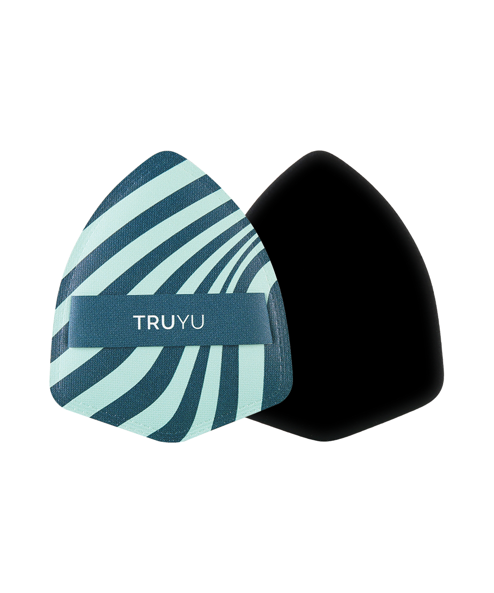 TRUYU Deluxe Makeup Puff. Out of Packaging. 1 sponge side with swirl pattern and finger strap with TRUYU logo. 1 sponge side, black sponge material. (View 1)