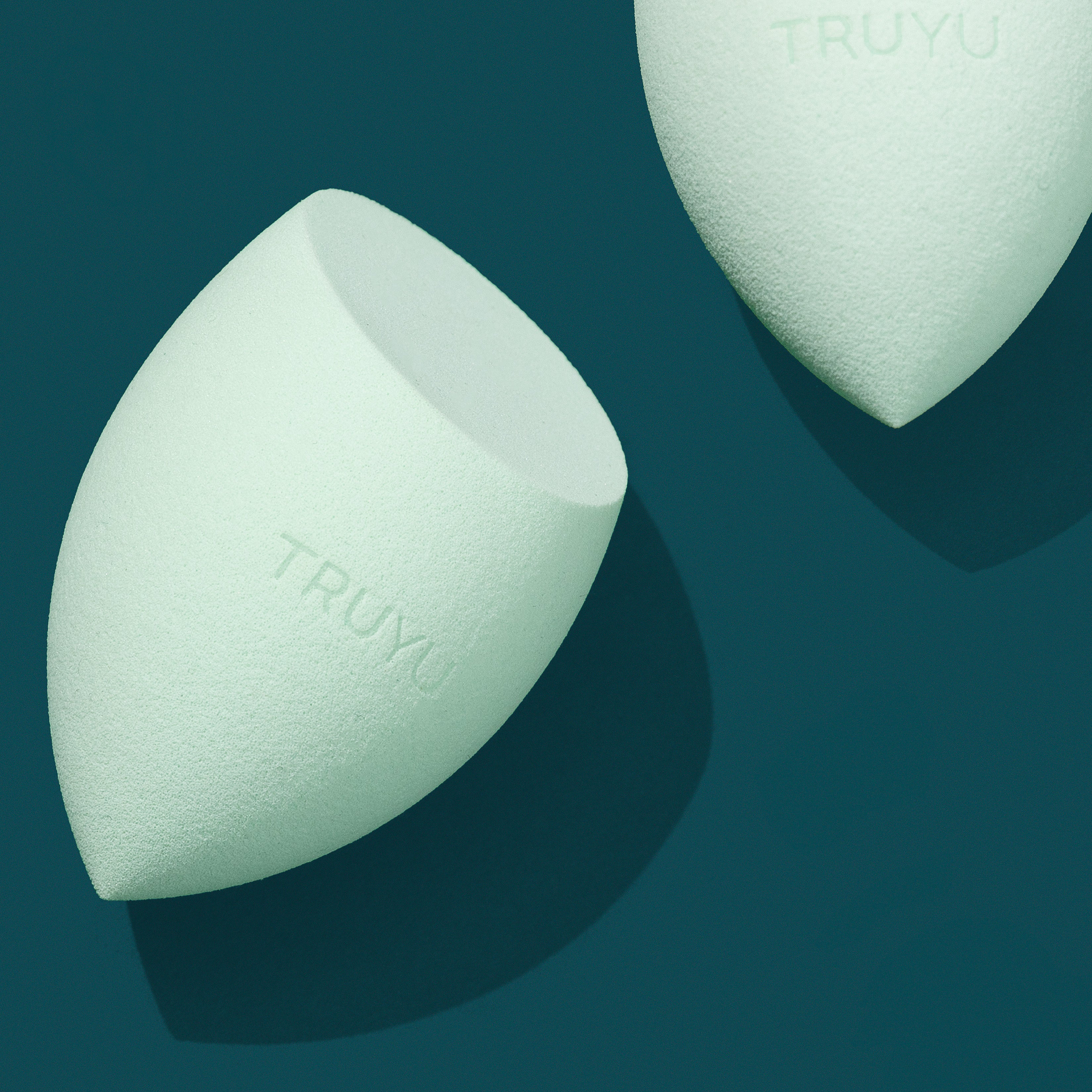 TRUYU Angled Blending Sponge Styled image on dark blue background.