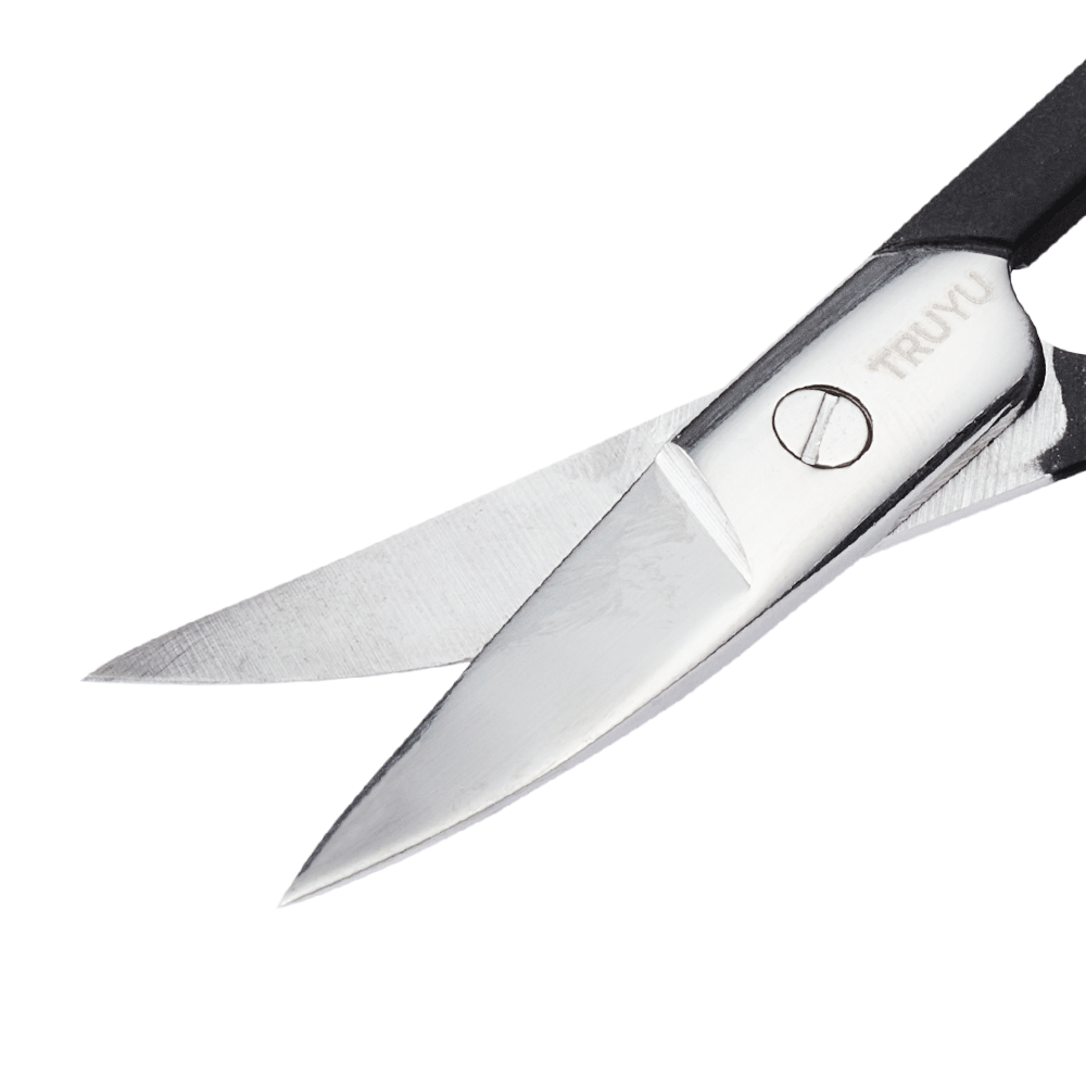 Zoomed in image of a black TRUYU Curved Nail Scissors. Close-up of scissor blades half-open.