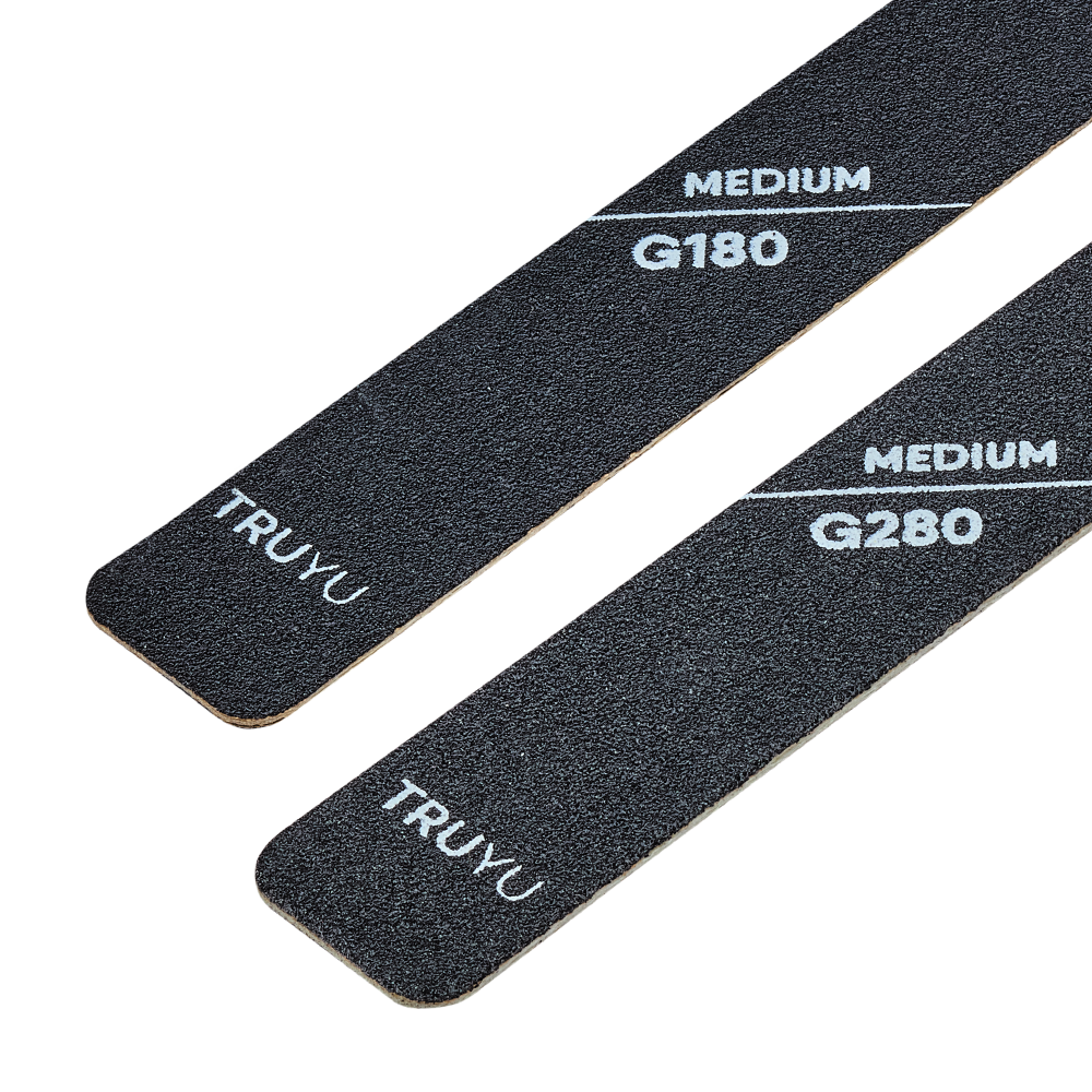 Zoomed in image of TRUYU Pro Nail Files (set of 2). Labelled 'TRUYU' with 'MEDIUM G180' and 'MEDIUM G280'.