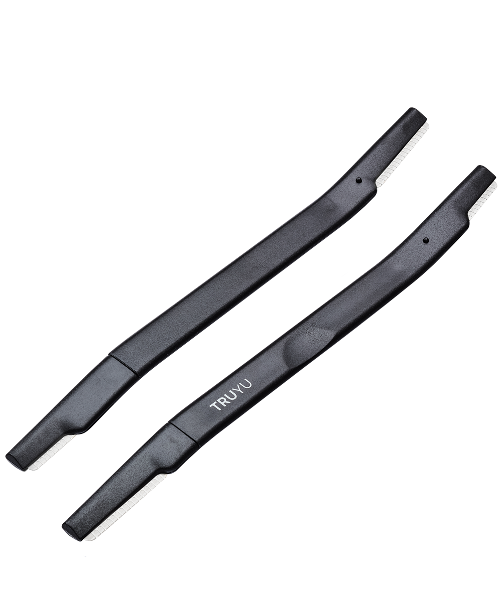 Angled image of black TRUYU Facial Razors. Set of 2. Dual ended with silver facial and brow blades. 
