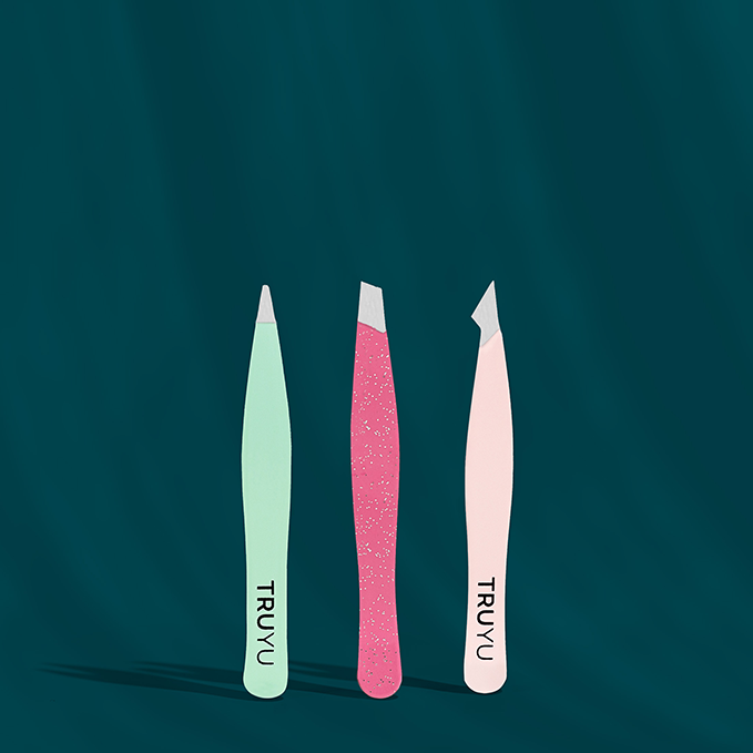 TRUYU Mini Tweezer Trio stood upright on dark green background. Shows all 3 tweezers; Point, Slant, Combo tip. 