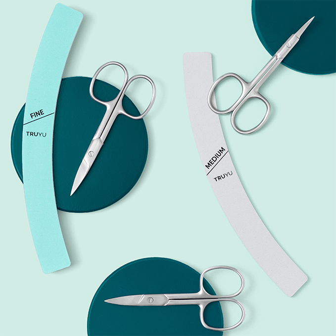 TRUYU Curved Nail Shapers, Cuticle Scissors, Straight Scissors and Curved Scissors on light blue background with dark blue circles. 